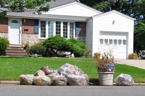 Garage clearance service for a cluttered London garage with bulky household items