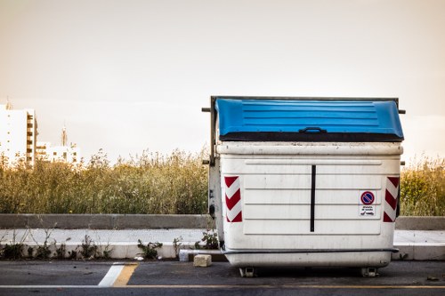 Workers sorting recyclable materials during a London rubbish clearance collection