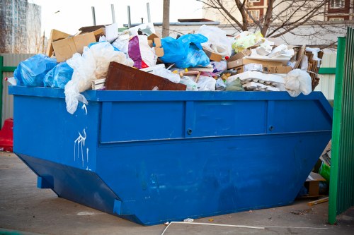 Council waste collection team working at a London residential property