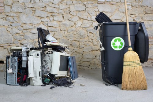 Local team collecting large household items from a flat