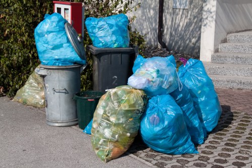 Litter clearance team removing waste from a London residential area