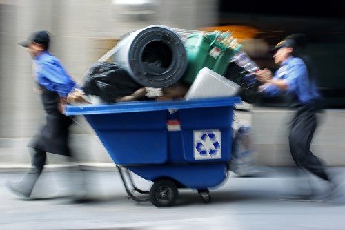 Local clearance crew loading furniture and mixed items in London