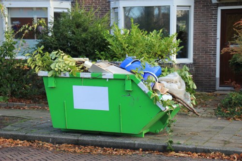 Local team loading green waste from a typical London terraced property
