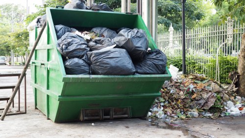 Prepared waste bags and furniture for collection in London